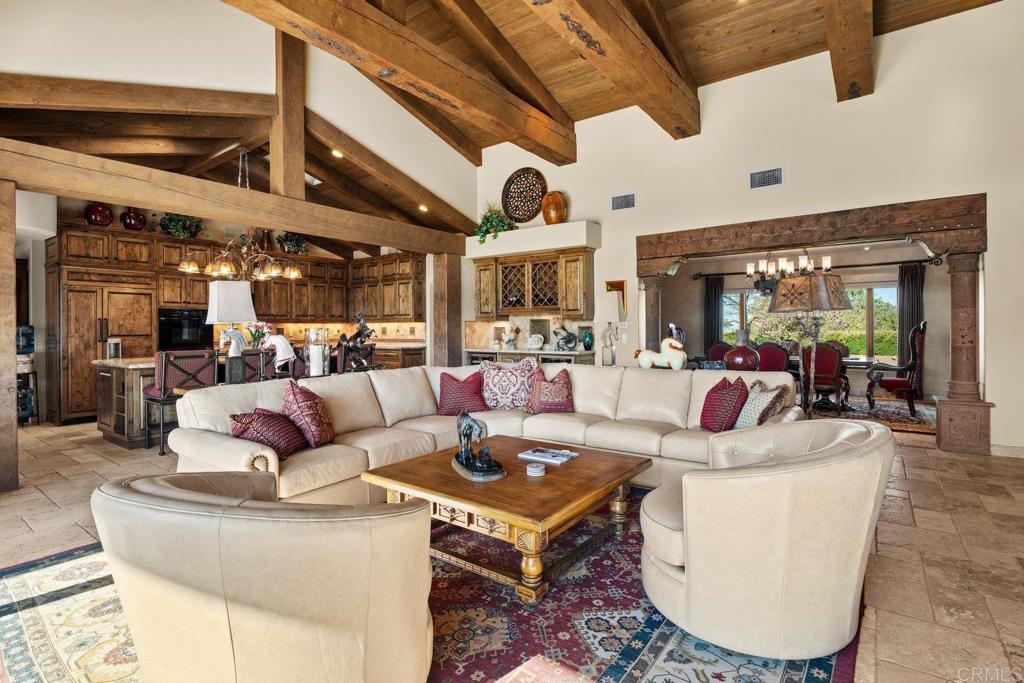 20655 Sutherland Dam Road Ramona, CA 92065 - Photo 25 of 73 a living room with furniture and a large window