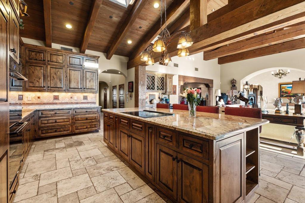 20655 Sutherland Dam Road Ramona, CA 92065 - Photo 31 of 73 a kitchen with stainless steel appliances granite countertop a sink and cabinets