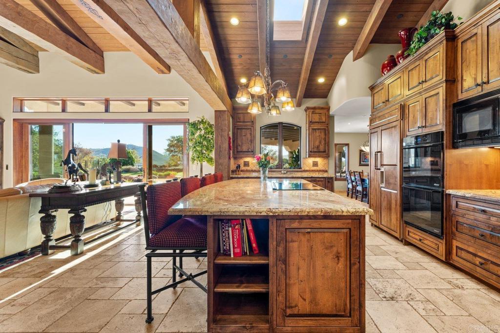 20655 Sutherland Dam Road Ramona, CA 92065 - Photo 32 of 73 a view of a big room with furniture window and wooden floor
