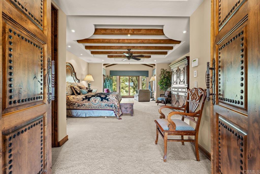 20655 Sutherland Dam Road Ramona, CA 92065 - Photo 36 of 73 a view of living room filled with furniture and a chandelier