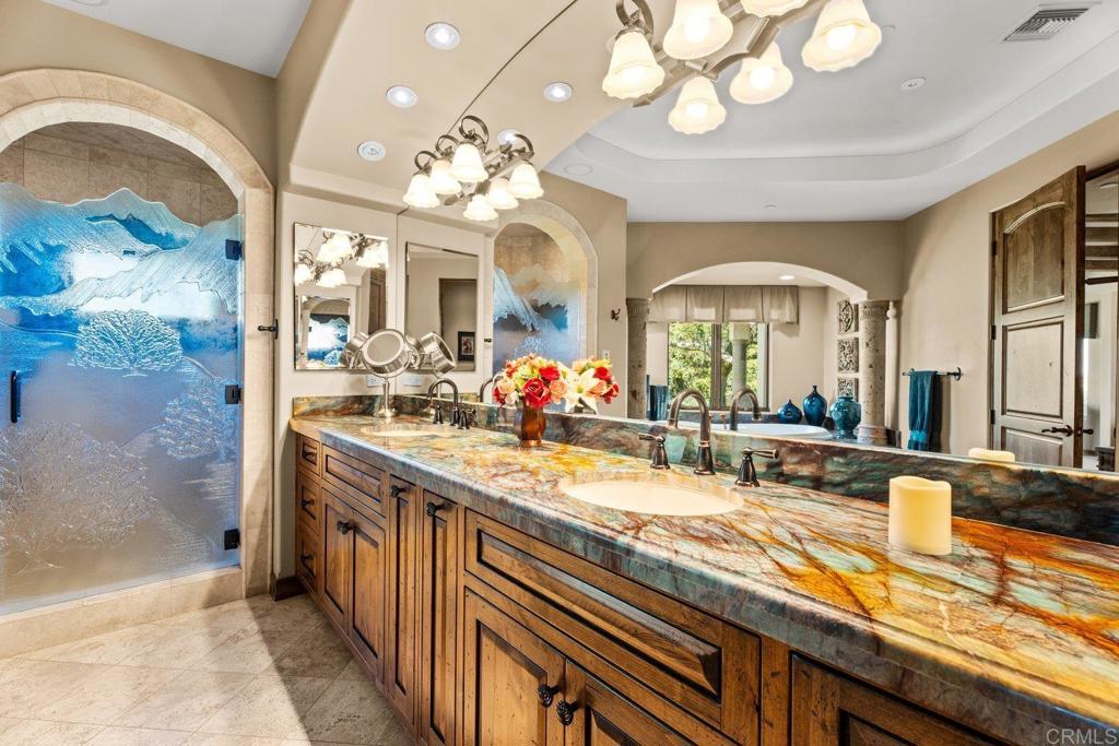 20655 Sutherland Dam Road Ramona, CA 92065 - Photo 40 of 73 a view of a kitchen a sink and a large mirror