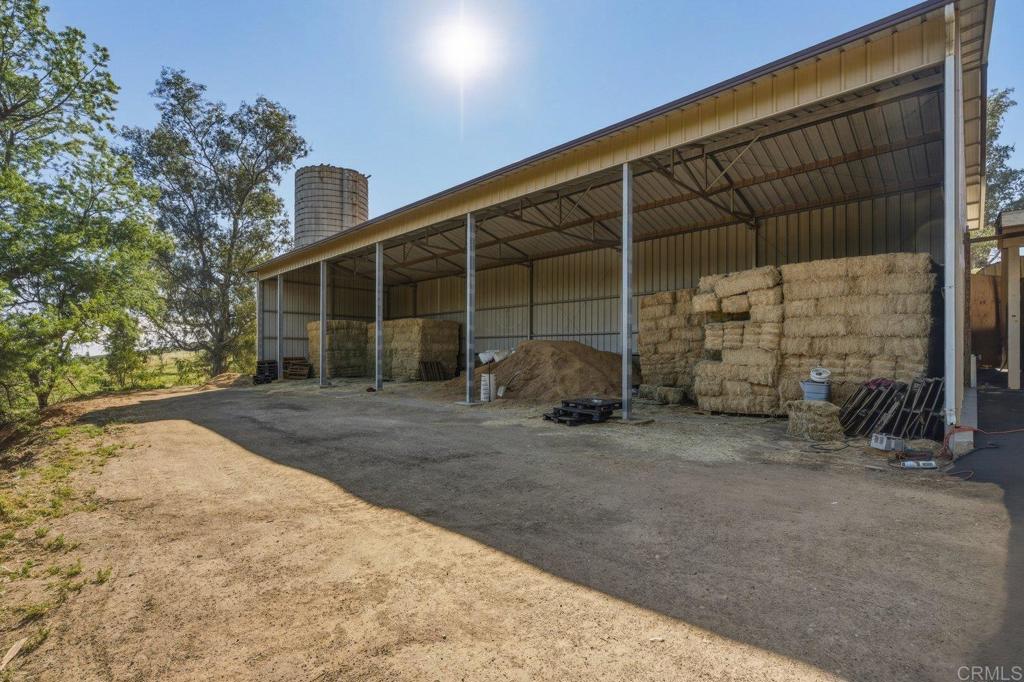 20655 Sutherland Dam Road Ramona, CA 92065 - Photo 51 of 73 a view of a house with backyard