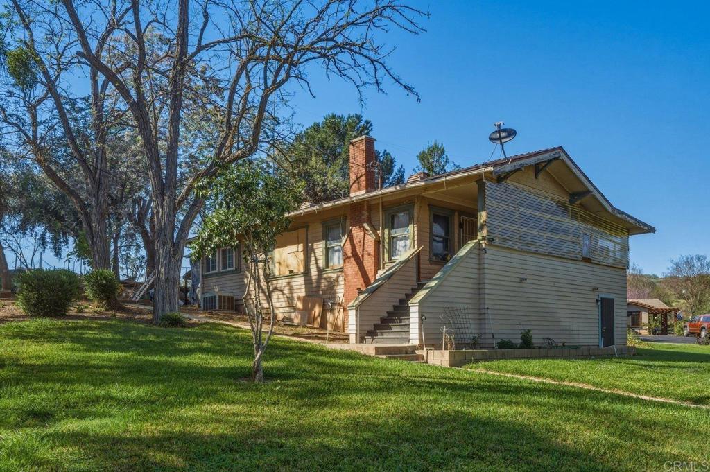 20655 Sutherland Dam Road Ramona, CA 92065 - Photo 55 of 73 a front view of a house with a yard