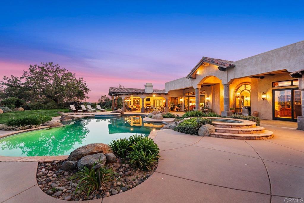 20655 Sutherland Dam Road Ramona, CA 92065 - Photo 62 of 73 a view of a patio with couches chairs and a potted plants