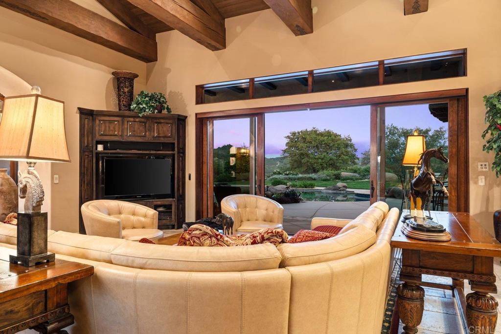 20655 Sutherland Dam Road Ramona, CA 92065 - Photo 69 of 73 a living room with furniture and a window