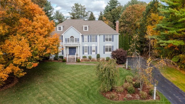 29 Stoneybrook Circle Andover, MA 01810 - Photo 1 of 41 a aerial view of a house with swimming pool next to a yard