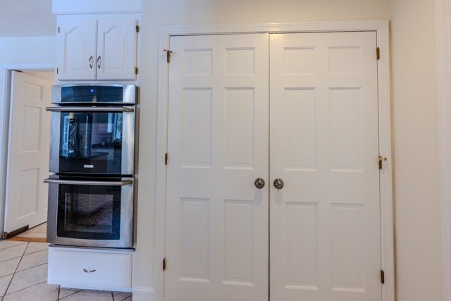 29 Stoneybrook Circle Andover, MA 01810 - Photo 12 of 41 a view of a kitchen from the hallway