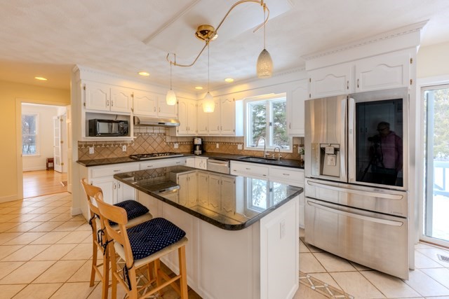 29 Stoneybrook Circle Andover, MA 01810 - Photo 15 of 41 a kitchen with a stove a sink and a refrigerator