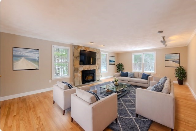 29 Stoneybrook Circle Andover, MA 01810 - Photo 18 of 41 a living room with furniture and a fireplace