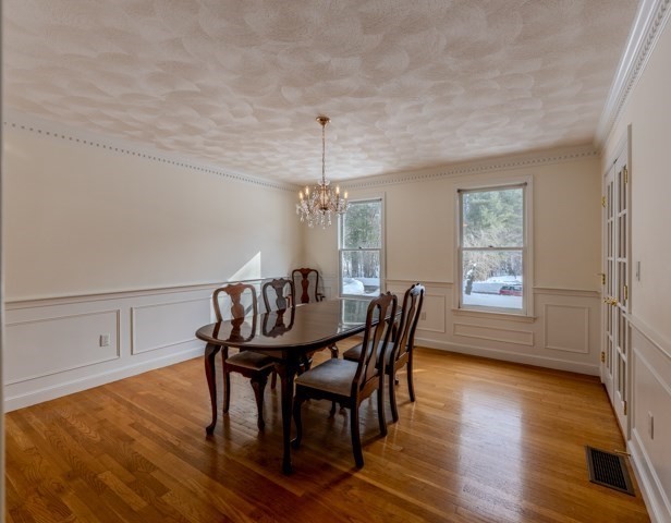 29 Stoneybrook Circle Andover, MA 01810 - Photo 23 of 41 a view of a dining room with furniture window and wooden floor