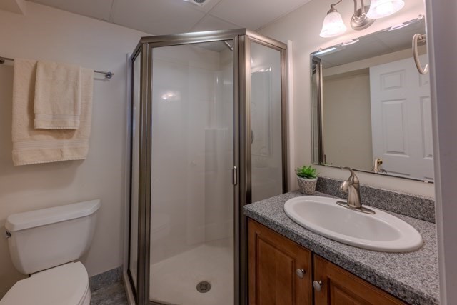 29 Stoneybrook Circle Andover, MA 01810 - Photo 41 of 41 a bathroom with a granite countertop sink toilet and shower