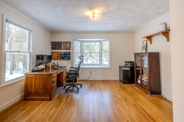 29 Stoneybrook Circle Andover, MA 01810 - Photo 10 of 41 a view of a workspace with furniture and a window