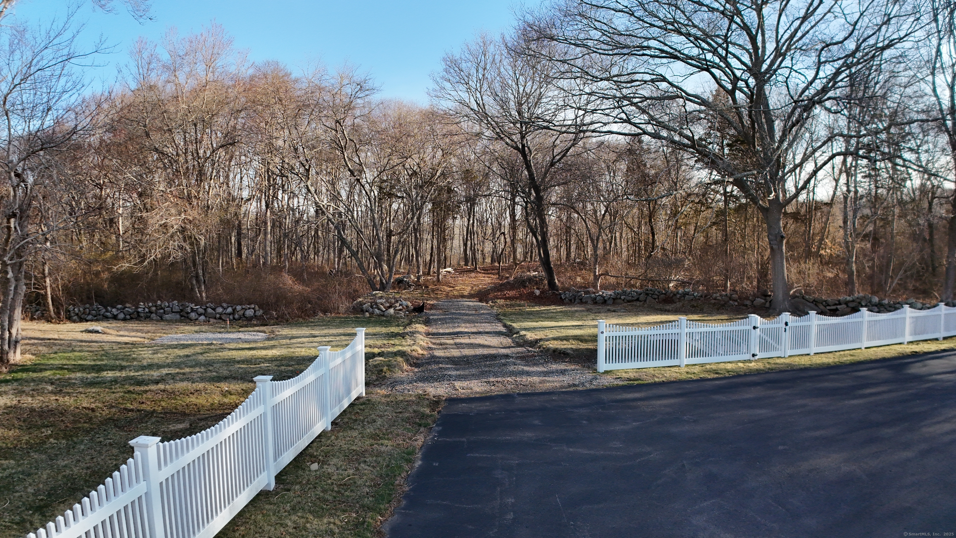 17 Old Stonington Road Stonington, CT 06378 - Photo 2 of 14 a view of a swimming pool with trees