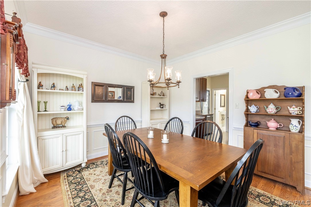 16211 River Road Chesterfield, VA 23838 - Photo 15 of 40 a dining room with furniture and wooden floor