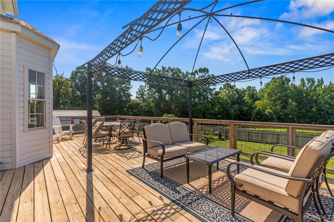 16211 River Road Chesterfield, VA 23838 - Photo 30 of 40 a view of chairs and table in the patio