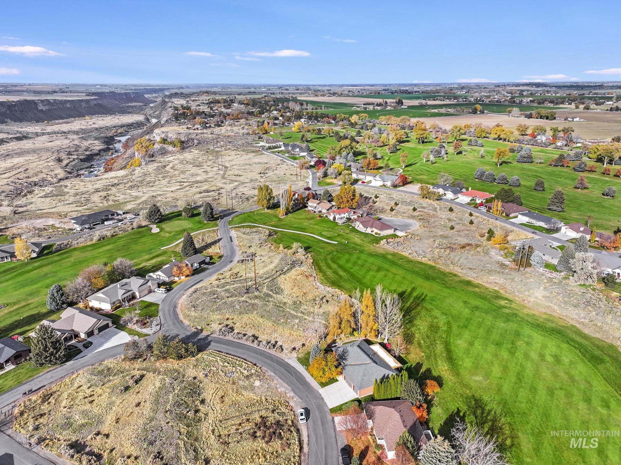 100 Olympic Road Jerome, ID 83338 - Photo 40 of 50 Aerial perspective showcasing a residential community with winding roads and varied topography