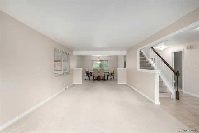 a view of an empty room and a windows