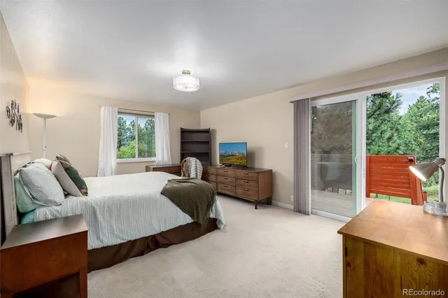 a outdoor living space with furniture and a fireplace