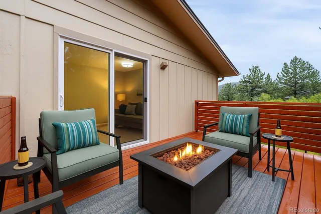 a bedroom with a bed and a lamp