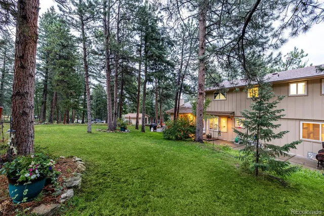 a view of a lake with a big yard