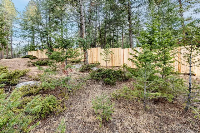 a picture of a bathroom with a shower