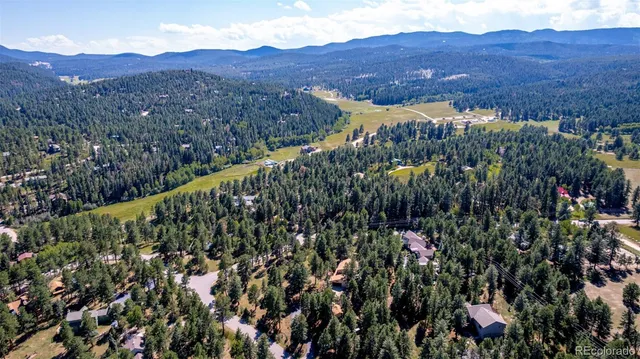 $915,000 | 28735 Little Big Horn Drive, Evergreen, CO 80439
