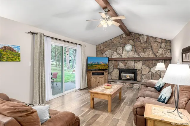 a view of fireplace with wooden door