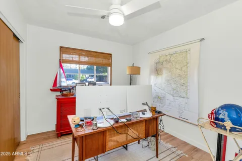 a workspace with furniture and window