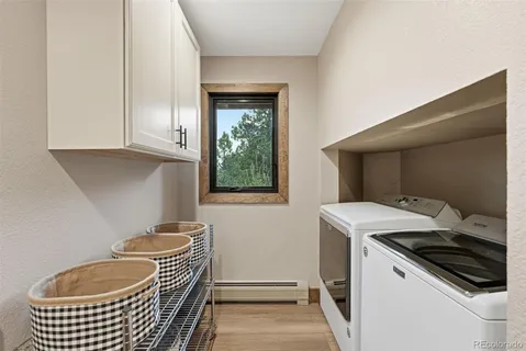 a bathroom with a sink and a window