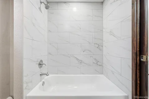 a bathroom with a bathtub