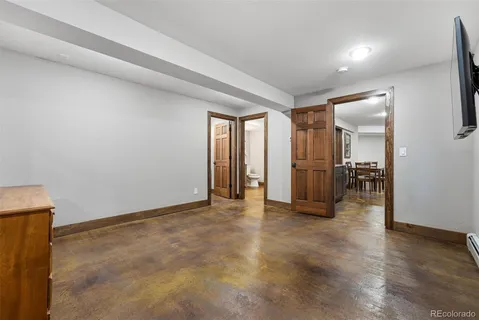 a view of a livingroom with wooden floor