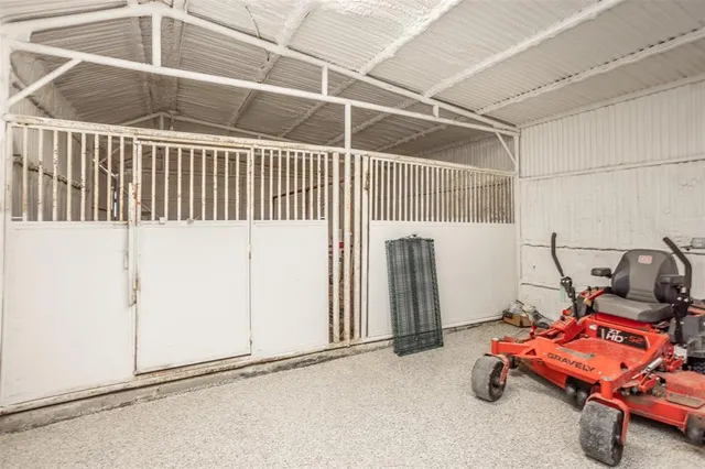 a view of a field with an trees