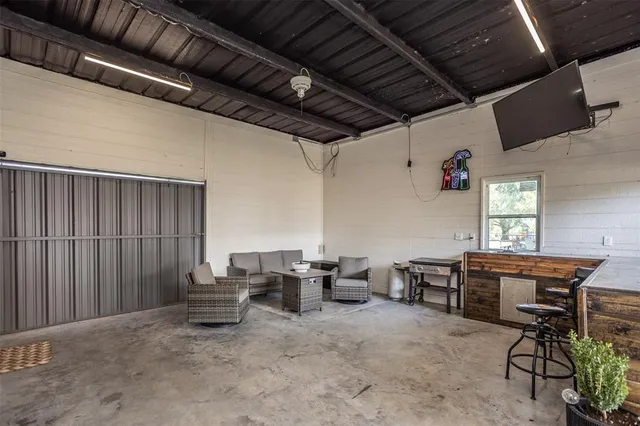 a view of a workspace with furniture