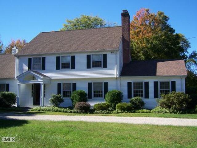 69 Codfish Hill Road Bethel, CT 06801 - Photo 1 of 1 a front view of a house with a yard