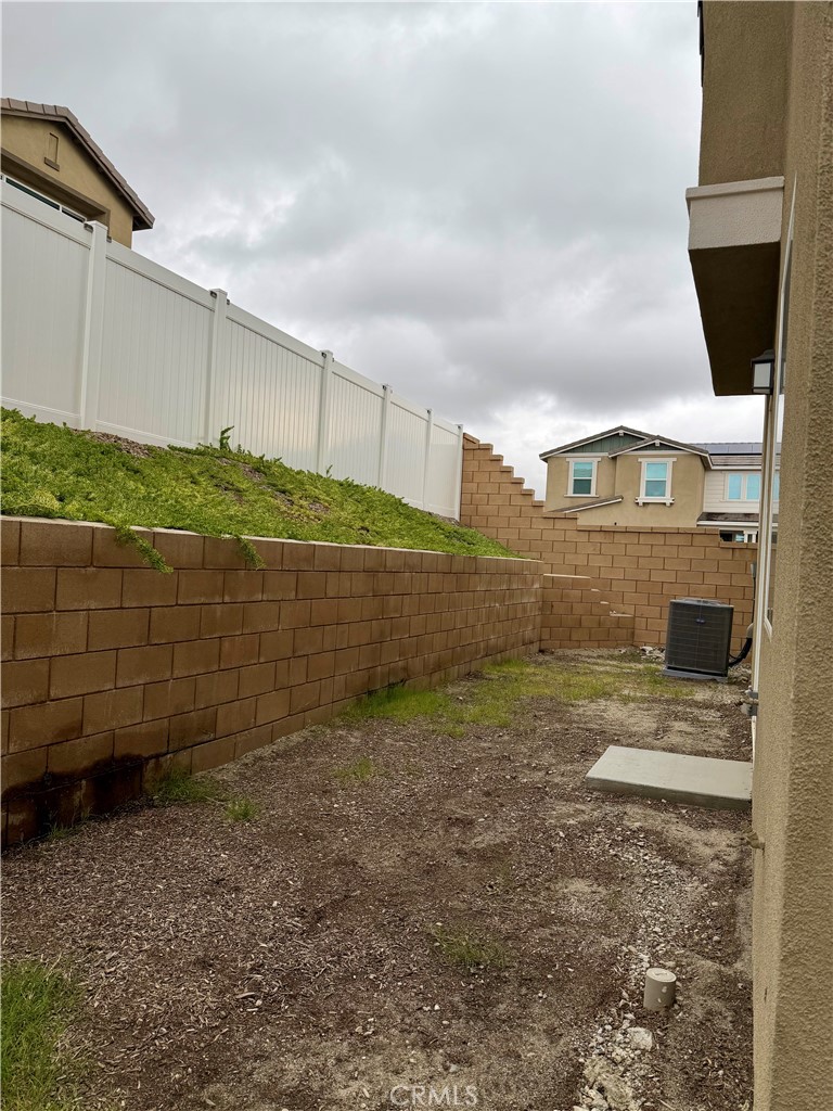 364 Castaic Way Rialto, CA 92377 - Photo 20 of 73 Low Maintenance Backyard offering the perfect canvas to create your ideal outdoor retreat.