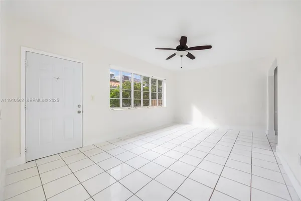 a view of an empty room and window