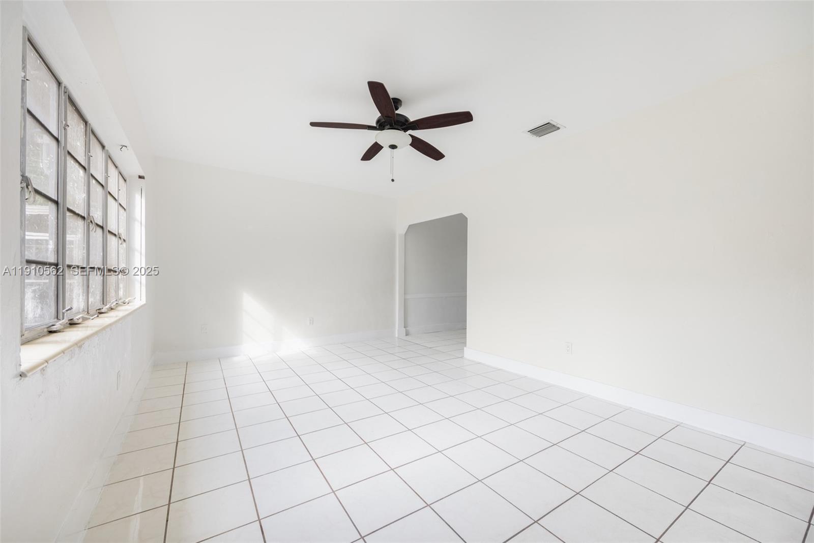 282 Northwest 41st Avenue Miami, FL 33126 - Photo 6 of 15 a view of an empty room
