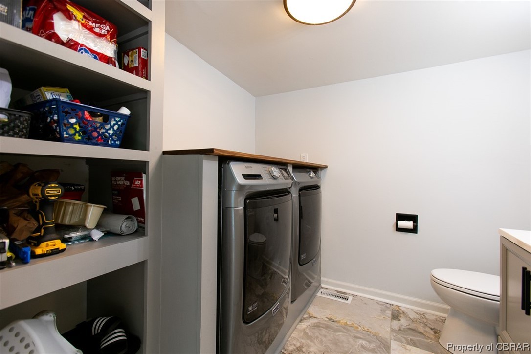 9223 Guinea Road Hayes, VA 23072 - Photo 27 of 50 Bathroom/Utility Room w ceramic tile floors installed in 2022.