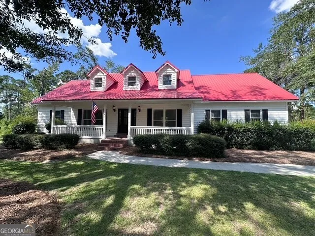 a view of a house with a swimming pool
