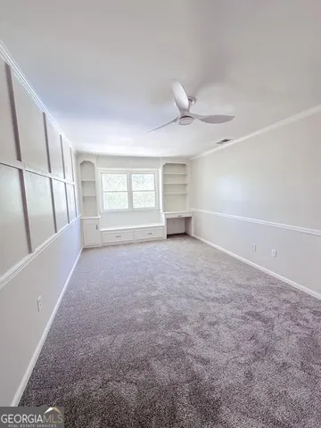 an empty room with a natural light