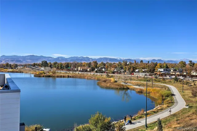 a view of a lake with city