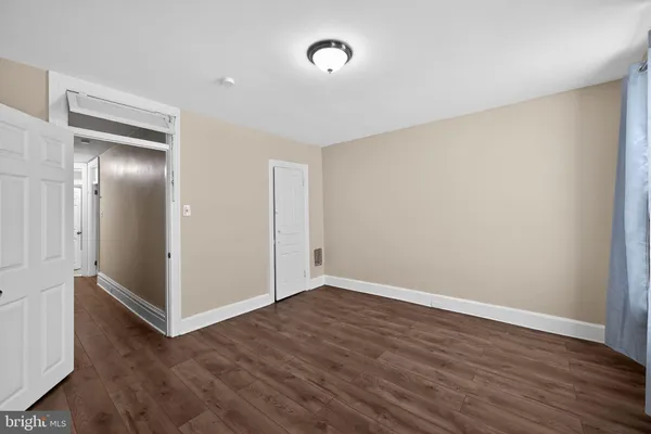 a kitchen with stainless steel appliances granite countertop a refrigerator a stove and a sink