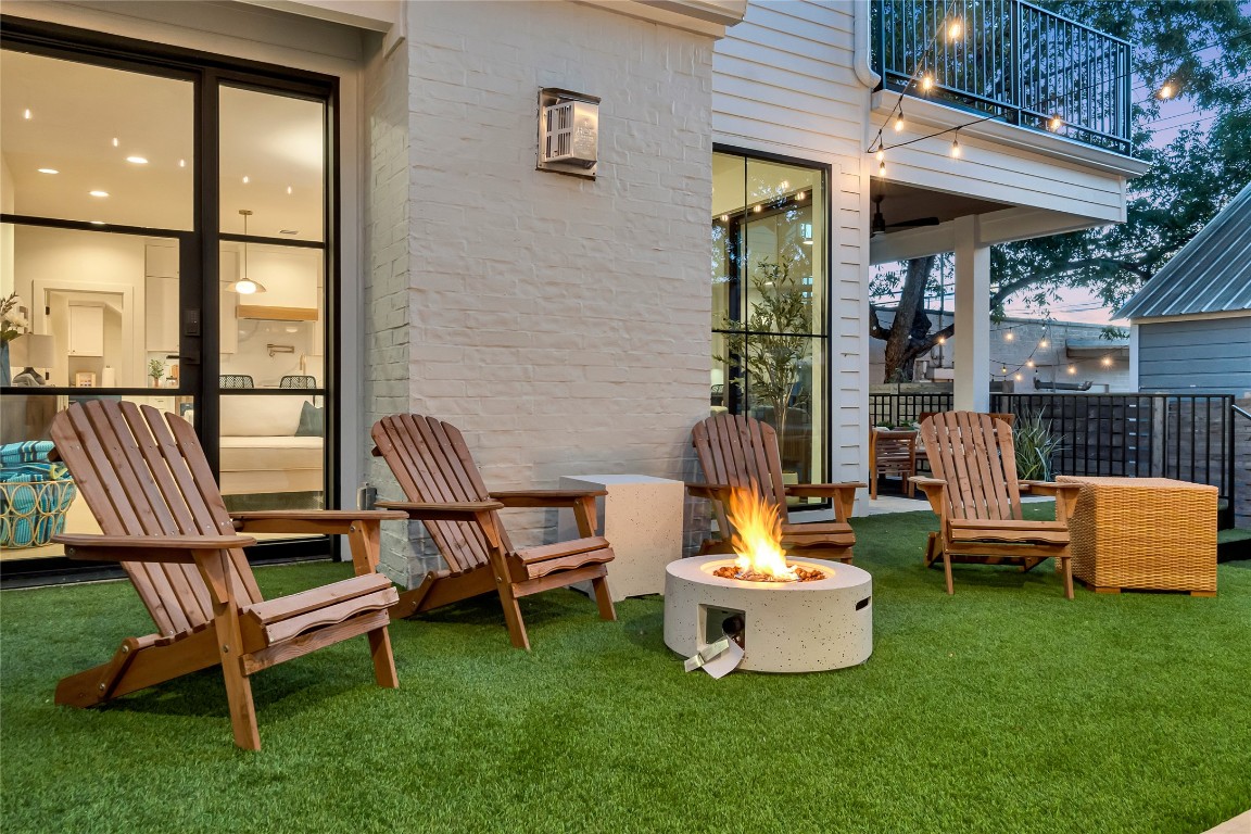 1902 Tillotson Avenue Austin, TX 78702 - Photo 36 of 40 a backyard of a house with table and chairs