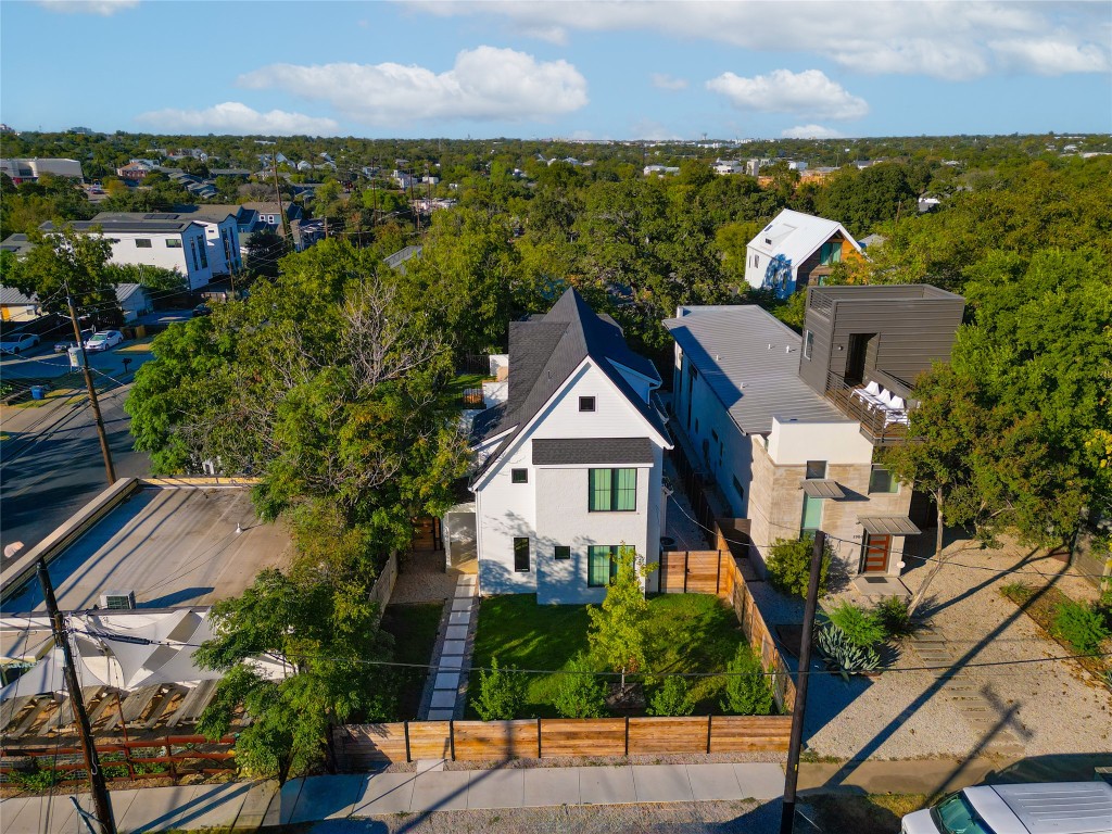 1902 Tillotson Avenue Austin, TX 78702 - Photo 39 of 40 an aerial view of a house with a garden and lake view