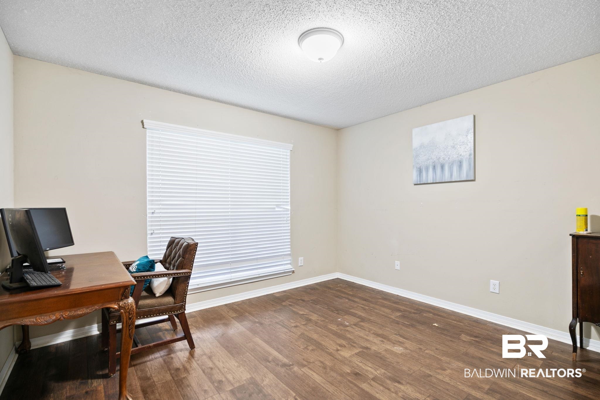 10550 Patrick Avenue Grand Bay, AL 36541 - Photo 30 of 43 Office area with a textured ceiling and wood-type flooring