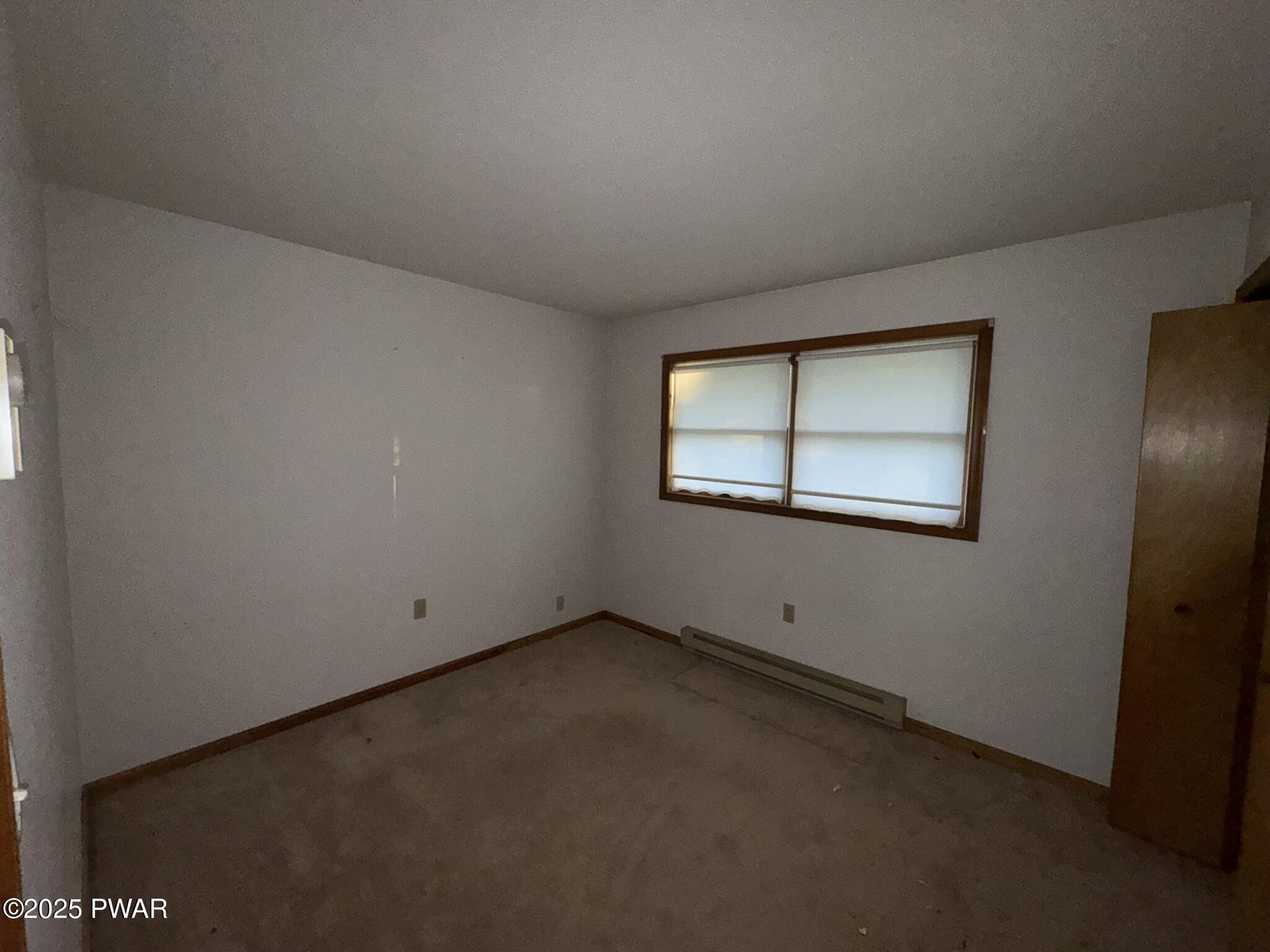 21 Tuthill Road Waymart, PA 18472 - Photo 15 of 49 an empty room with windows