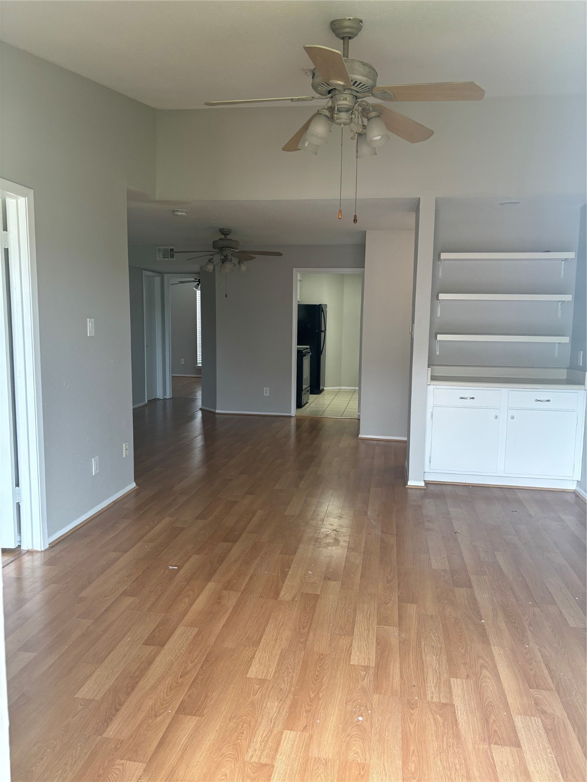 18800 Egret Bay Boulevard, Unit 1100 Webster, TX 77058 - Photo 4 of 7 wooden floor in an empty room with a window