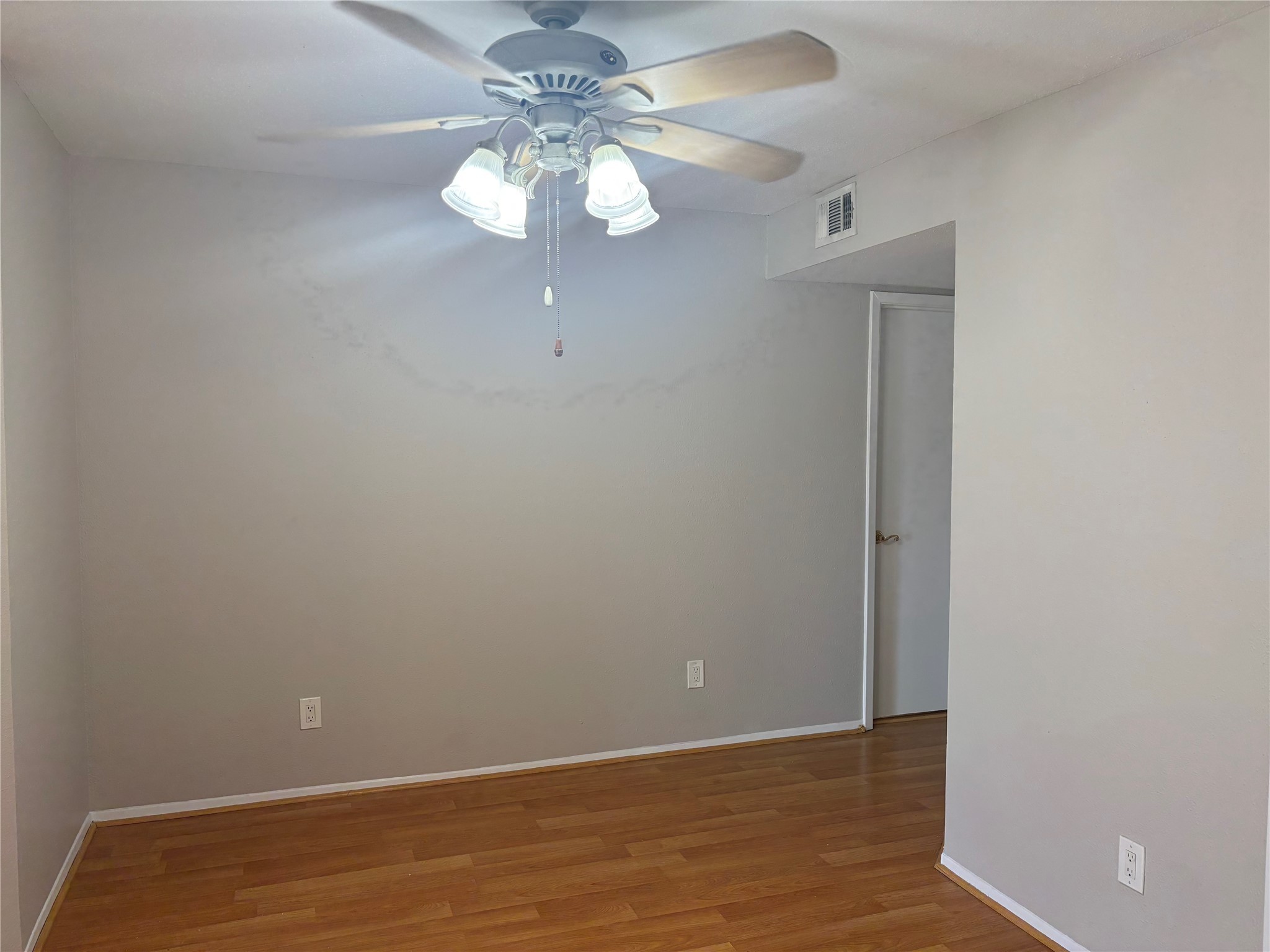 18800 Egret Bay Boulevard, Unit 1100 Webster, TX 77058 - Photo 5 of 7 a view of an empty room with a chandelier fan