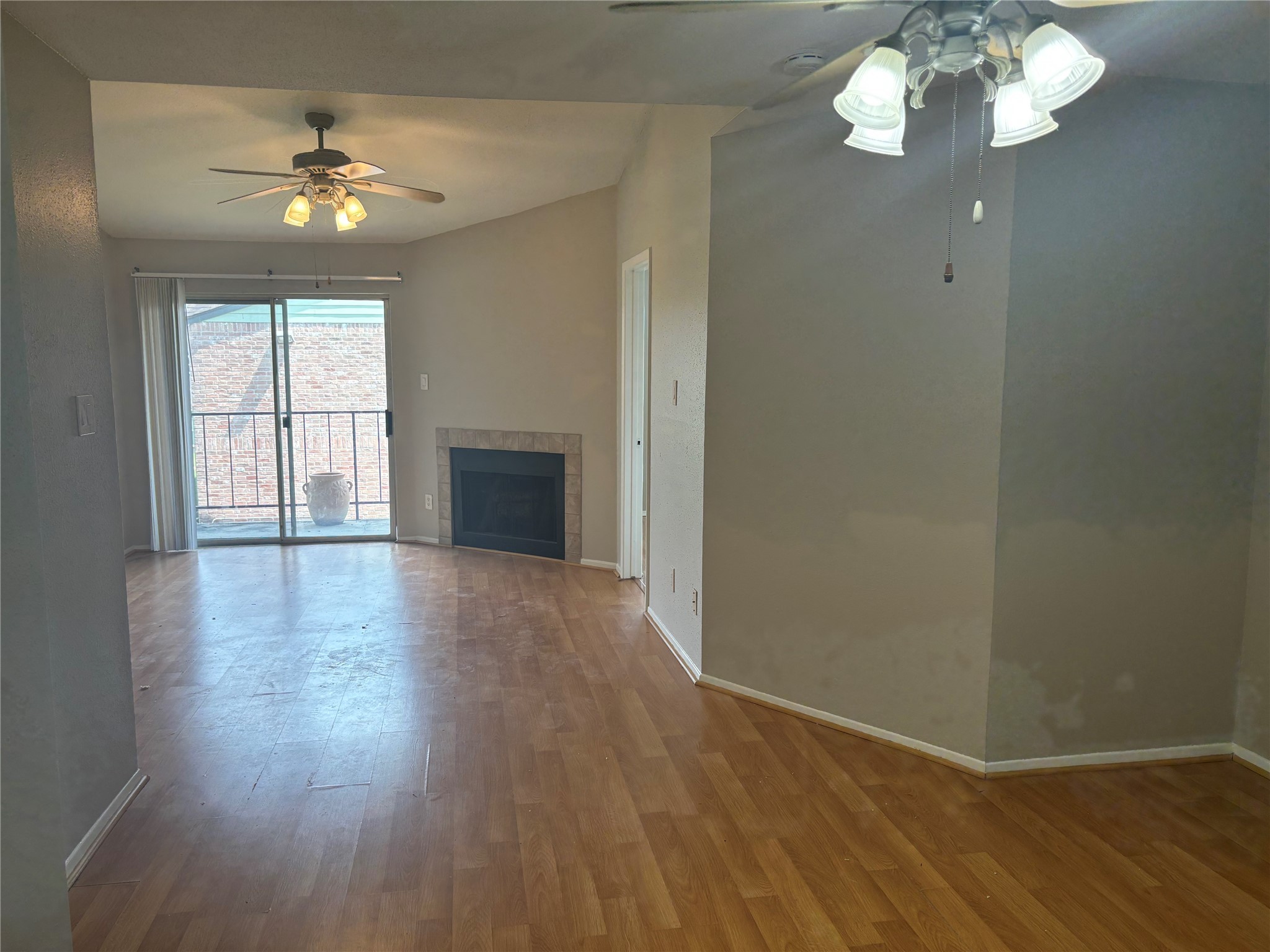 18800 Egret Bay Boulevard, Unit 1100 Webster, TX 77058 - Photo 6 of 7 a view of an empty room with wooden floor and a window