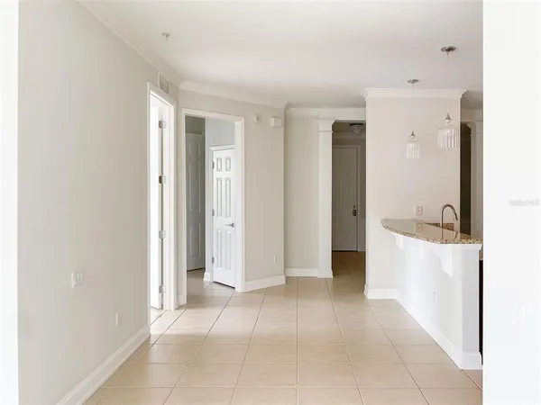 a view of a bathroom with a tub shower and a sink